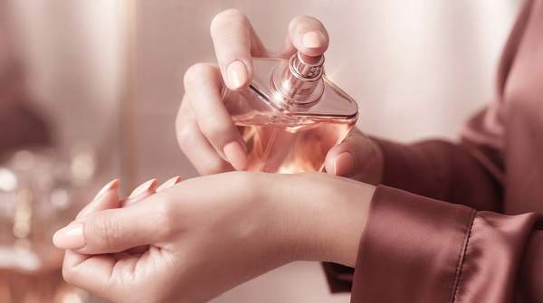 Editorial illustration for Why Scent Layering Works: The Chemistry Behind a Lasting Signature Fragrance